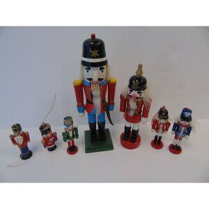 Vintage Collection Of 7 Christmas Nutcrackers Various Sizes Ornaments